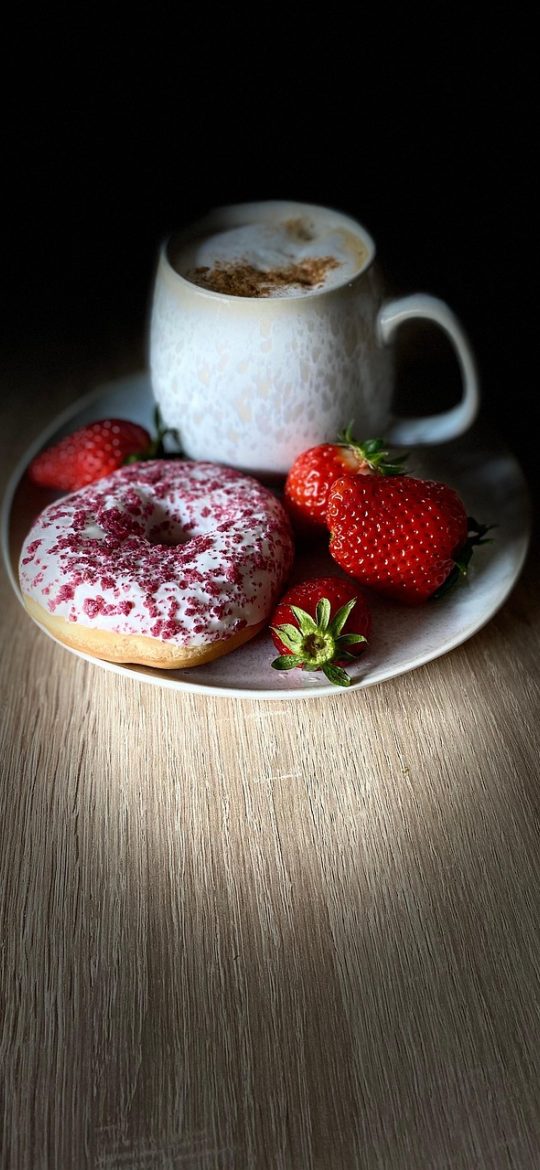 番茄todo 专注计时主界面截图，暖橙色圆环表盘中央显示剩余的二十五分钟专注时间，下方是开始与暂停按钮，整体界面安静简洁